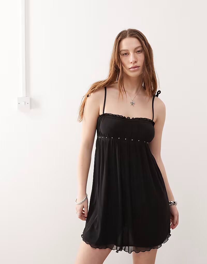 Мини-платье Motel Damiera с заклепками черного цвета
Мини-платье Motel Damiera с заклепками черного цвета