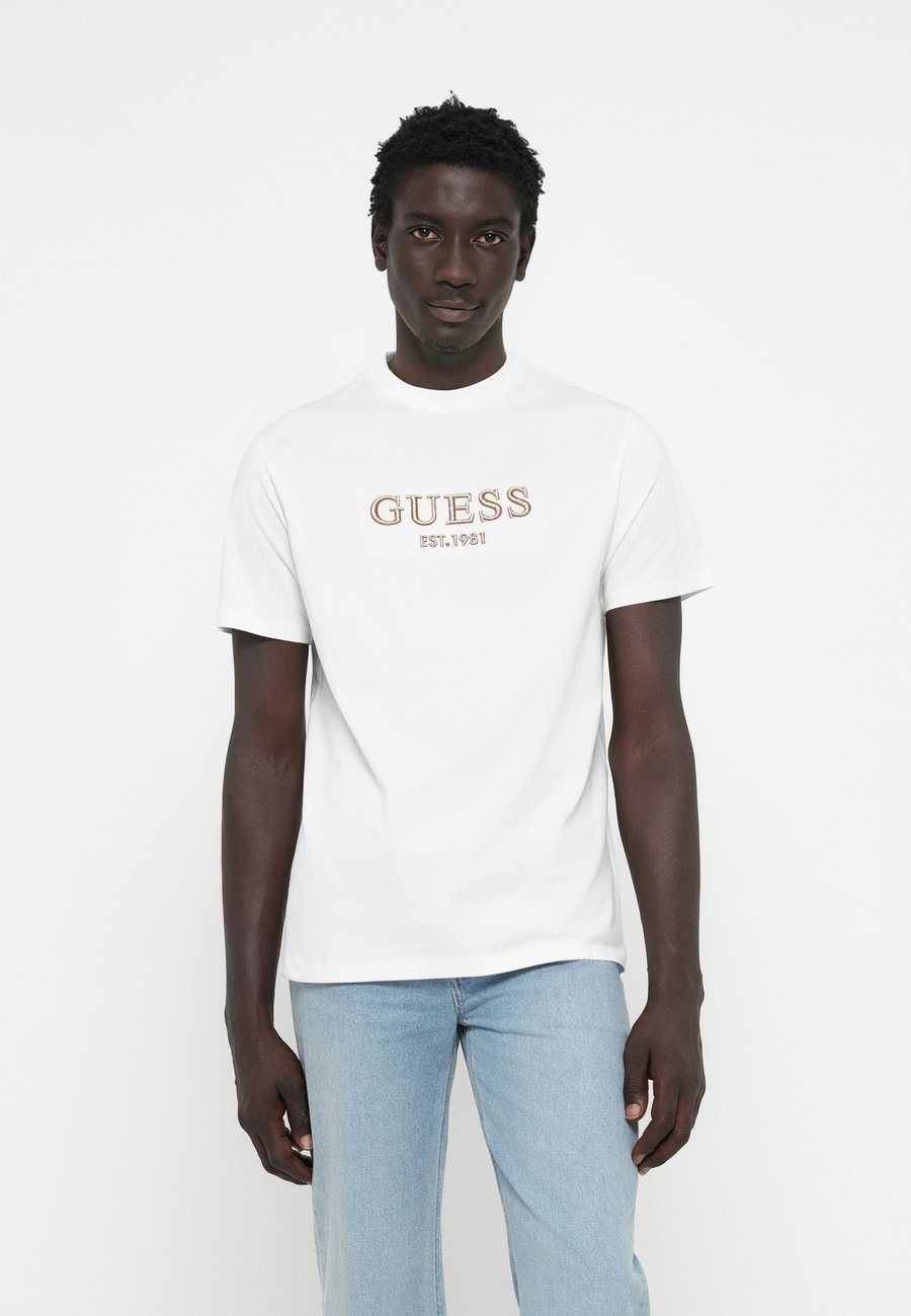 Футболка Guess LOGO TEE, Pure White/White
Футболка Guess LOGO TEE, Pure White/White