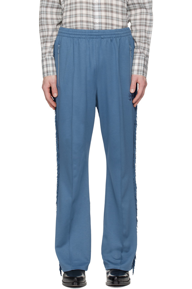 Needles Темно-Синие спортивные брюки-клеш с бахромой
Needles Темно-Синие спортивные брюки-клеш с бахромой