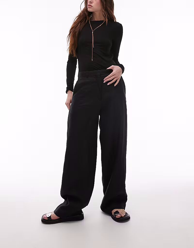 Льняные брюки прямого кроя ARKET с плоским передом черного цвета
Льняные брюки прямого кроя ARKET с плоским передом черного цвета