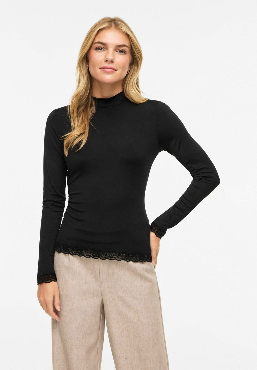 Топ VILA MIT VILEOA STEHKRAGEN, Black Beauty/Anthracite
Топ VILA MIT VILEOA STEHKRAGEN, Black Beauty/Anthracite