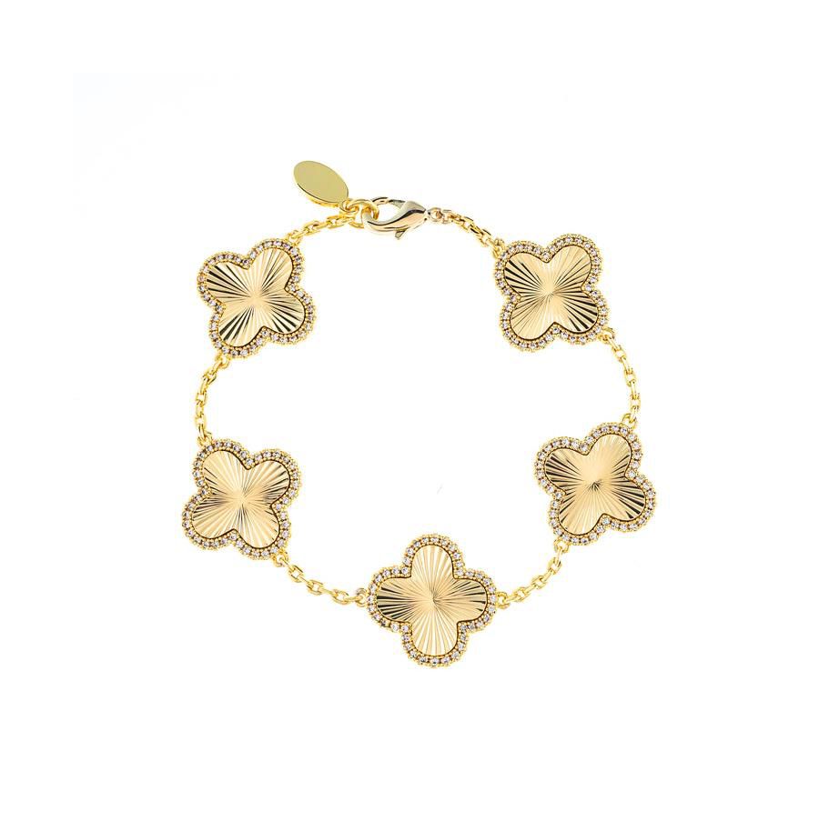 Браслет с пятью цветочными мотивами, покрытый 18-каратным золотом Rivka Friedman, Gold with clear cz
Браслет с пятью цветочными мотивами, покрытый 18-каратным золотом Rivka Friedman, Gold with clear cz