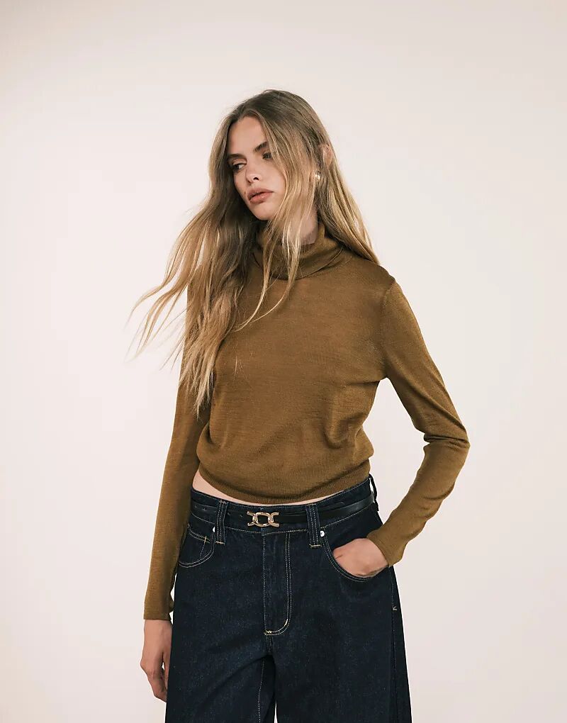 Тонкий водолазка Mango бежевого цвета
Тонкий водолазка Mango бежевого цвета