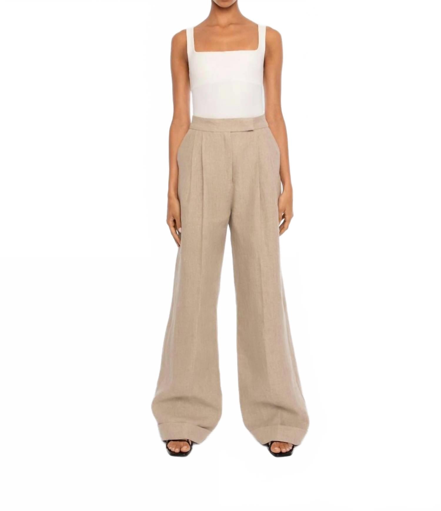 Широкие брюки натурального цвета Dāl the Label 
Широкие брюки натурального цвета Dāl the Label