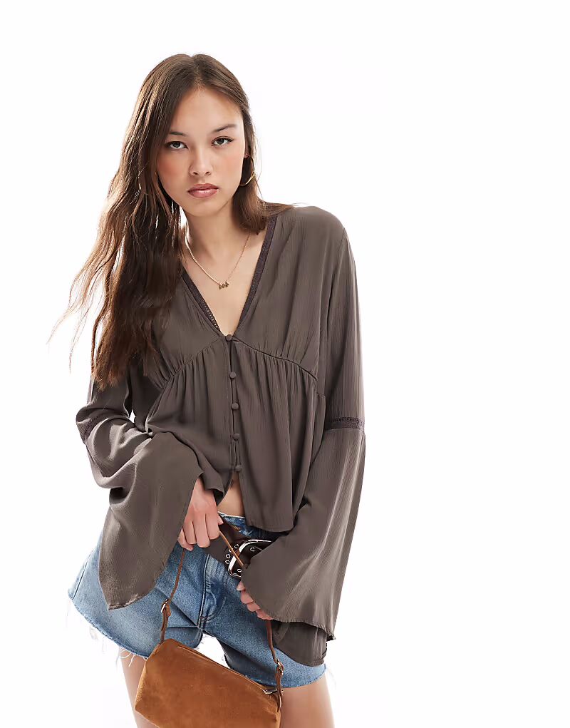 Блузка Miss Selfridge с расклешенными рукавами и застежкой на пуговицы, шоколадного цвета
Блузка Miss Selfridge с расклешенными рукавами и застежкой на пуговицы, шоколадного цвета