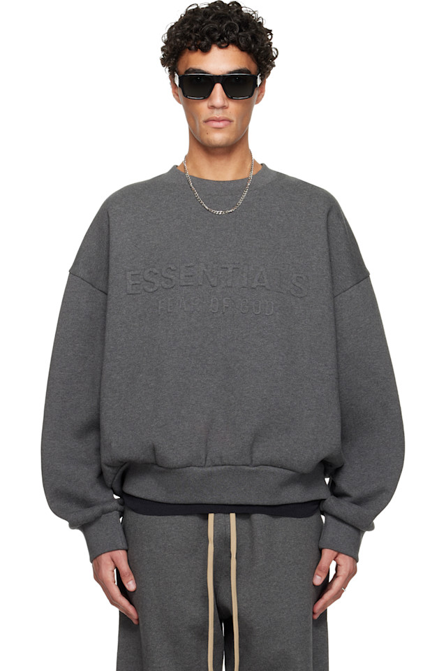 Fear Of God Essentials Классическая толстовка с круглым вырезом и тиснением на тему праздников серого цвета
Fear Of God Essentials Классическая толстовка с круглым вырезом и тиснением на тему праздников серого цвета