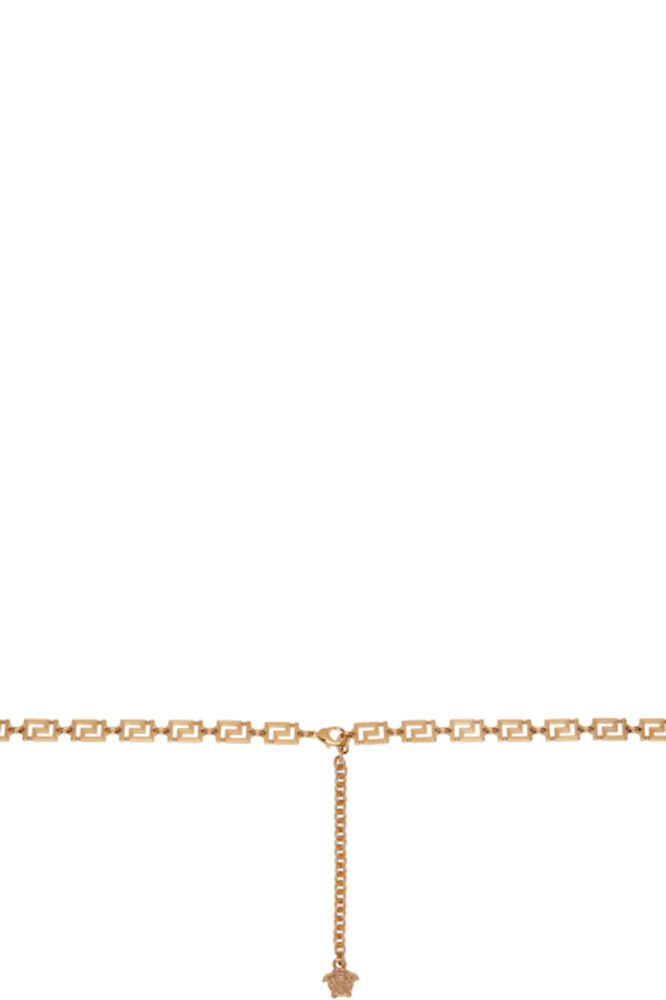 Золотой пояс-цепочка с изображением богини Грека Versace
Золотой пояс-цепочка с изображением богини Грека Versace