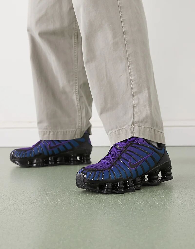 Кроссовки Nike Shox TL фиолетового цвета
Кроссовки Nike Shox TL фиолетового цвета