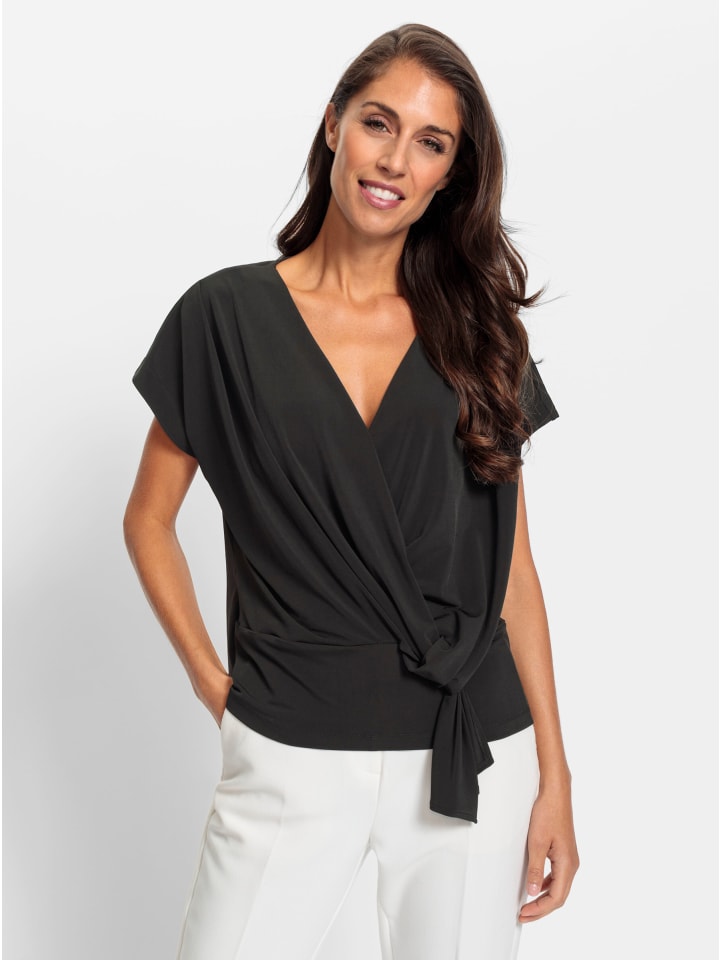 Рубашка-пачка черного цвета Heine
Рубашка-пачка черного цвета Heine