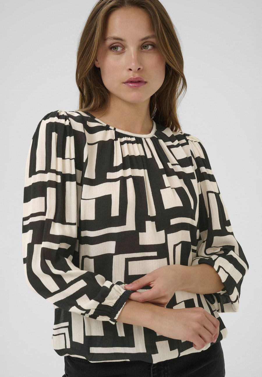 Блуза Kaffe LORINA AMBER, Black/White Graphic/Black
Блуза Kaffe LORINA AMBER, Black/White Graphic/Black