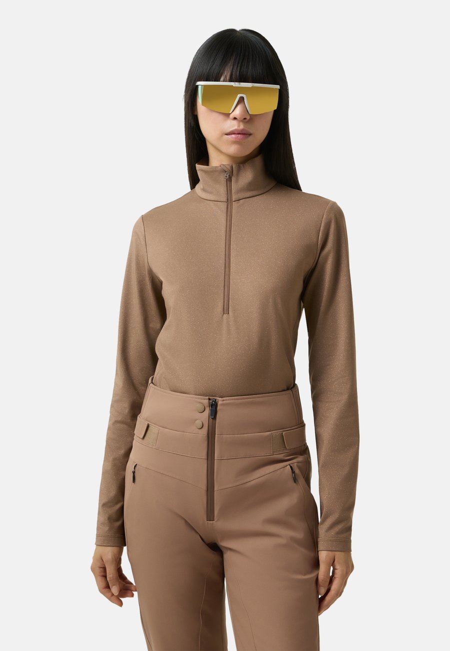 Топ Bogner Fire + Ice FIRST LAYER MARGO, Karamell/Camel
Топ Bogner Fire + Ice FIRST LAYER MARGO, Karamell/Camel