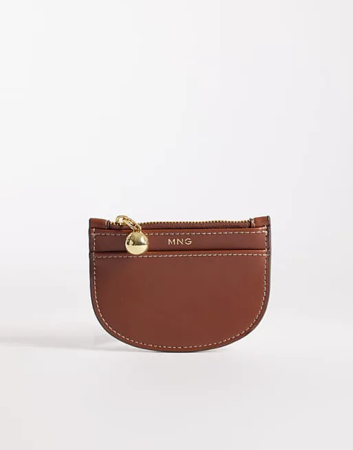 Светло-коричневый кошелек-полумесяц Mango в форме полумесяца
Светло-коричневый кошелек-полумесяц Mango в форме полумесяца