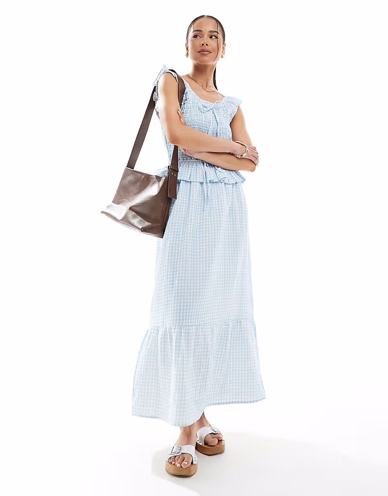 Платье миди в клетку с оборками Native Youth светло-голубого цвета
Платье миди в клетку с оборками Native Youth светло-голубого цвета
