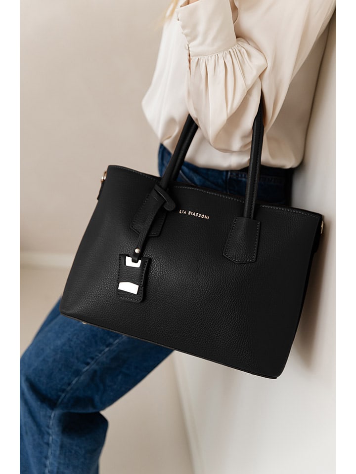 Lia Biassoni Кожаная сумка черного цвета - (Ш)38 x (В)24 x (Г)15 см
Lia Biassoni Кожаная сумка черного цвета - (Ш)38 x (В)24 x (Г)15 см