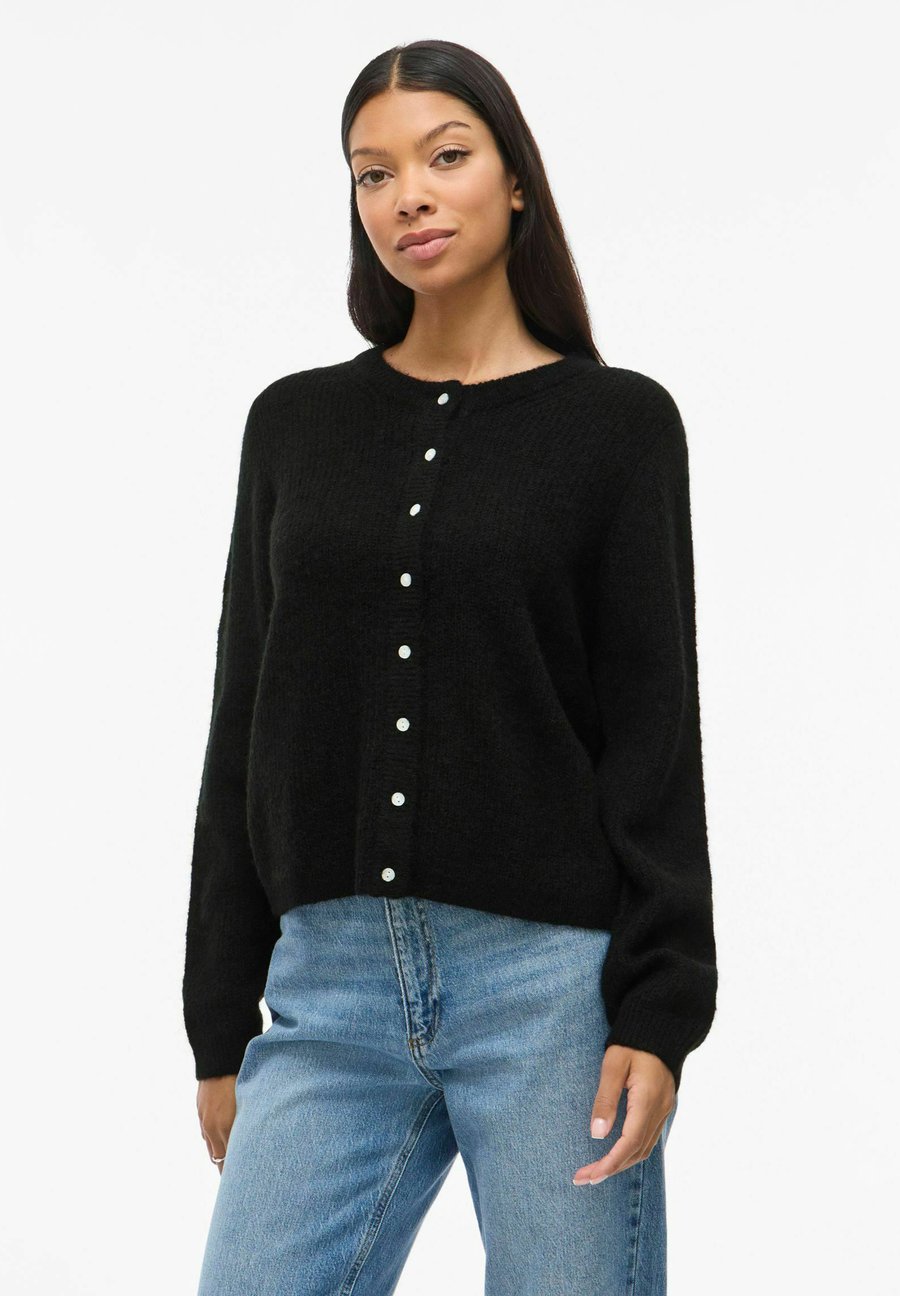Кардиган VILA VILORY O NECK CARDIGAN, Black Beauty/Black
Кардиган VILA VILORY O NECK CARDIGAN, Black Beauty/Black