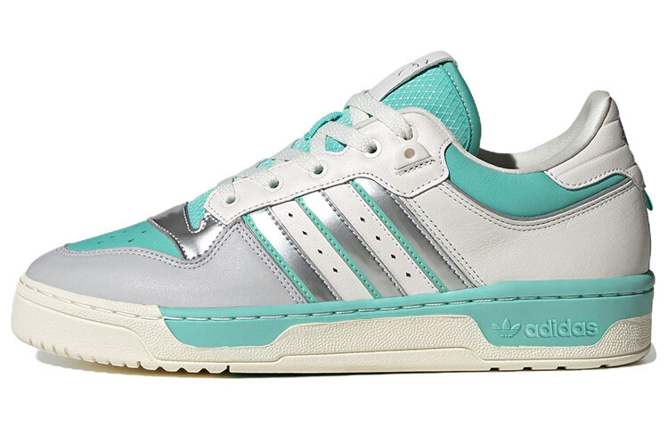 Кроссовки Adidas Originals Rivalry Skateboarding Unisex IE2442, белый/серебристый/голубой
Кроссовки Adidas Originals Rivalry Skateboarding Unisex IE2442, белый/серебристый/голубой