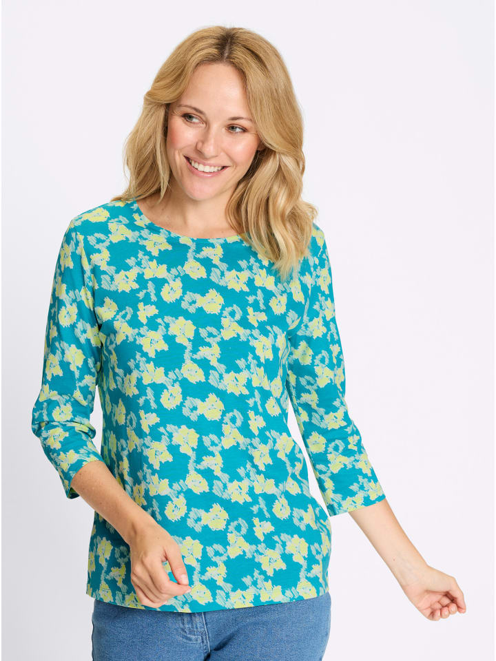 Рубашка с рукавами 3/4 с бирюзовым и фисташковым принтом Sieh an!
Рубашка с рукавами 3/4 с бирюзовым и фисташковым принтом Sieh an!