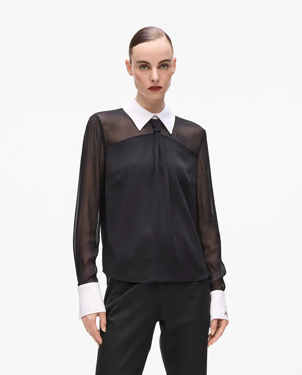 Черная и белая блузка с галстуком Karl Lagerfeld
Черная и белая блузка с галстуком Karl Lagerfeld