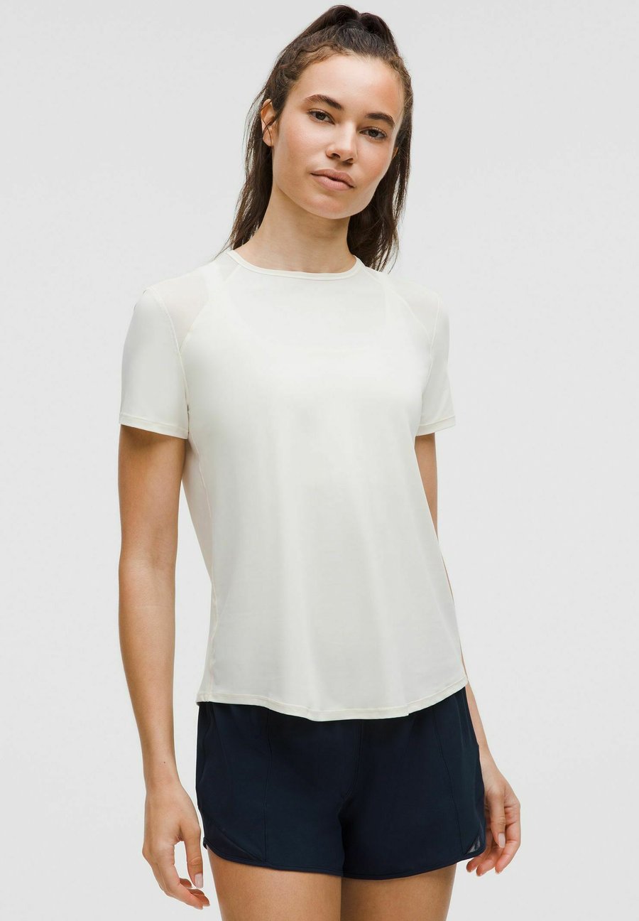 Топ lululemon SCULPT, Light Ivory/Not Defined
Топ lululemon SCULPT, Light Ivory/Not Defined