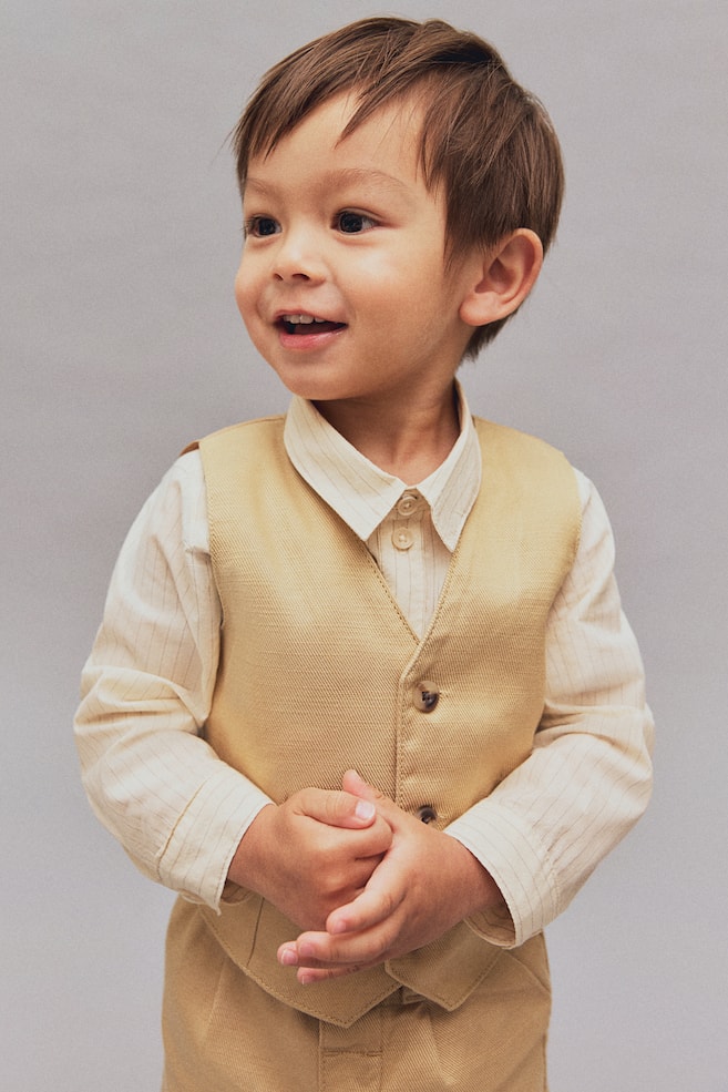 Твиловый жилет H&M, бежевый
Твиловый жилет H&M, бежевый