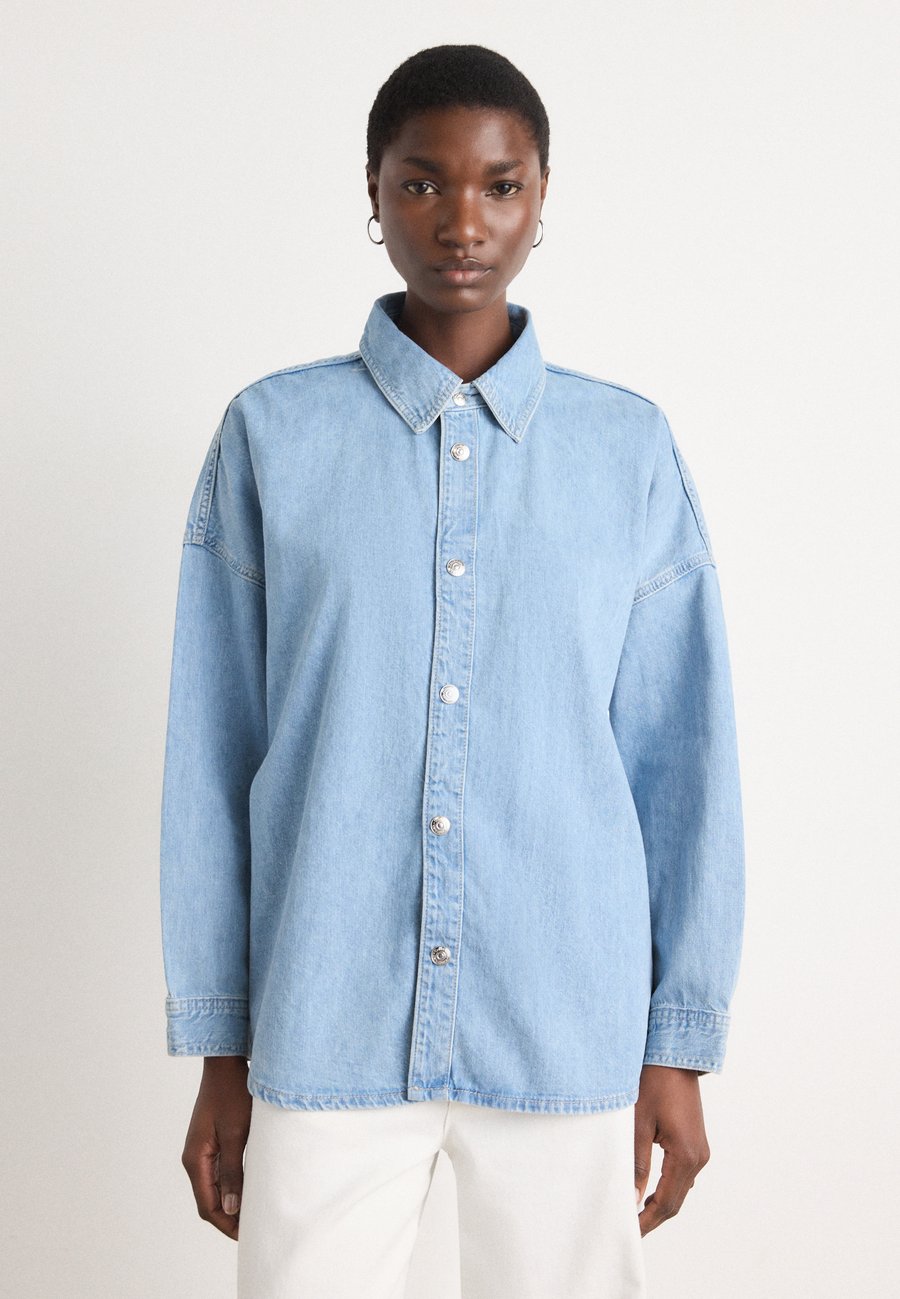 Блуза Calvin Klein Jeans Button-down blouse, Aaron Indigo/Light-Blue Denim
Блуза Calvin Klein Jeans Button-down blouse, Aaron Indigo/Light-Blue Denim