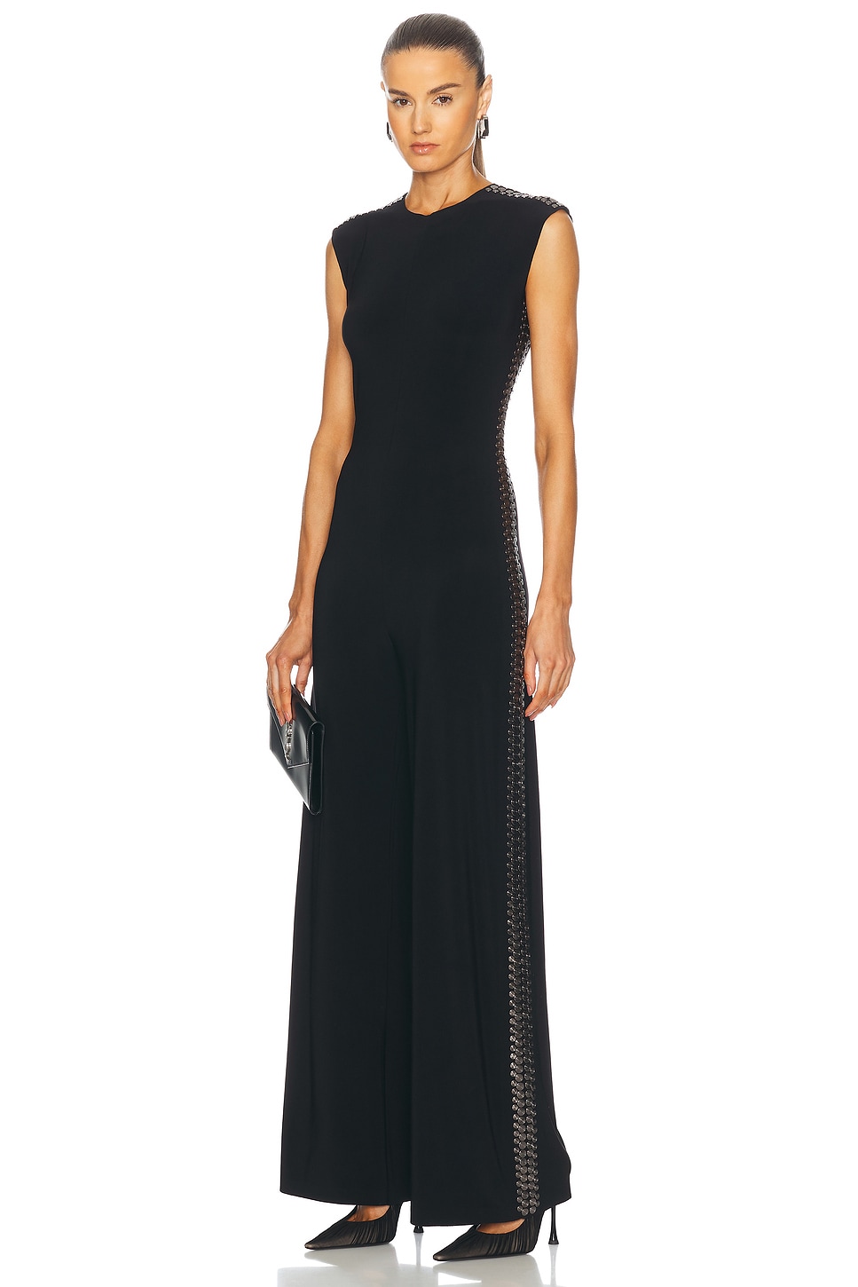 Комбинезон без рукавов цвета бронзы с заклепками Norma Kamali, черный
Комбинезон без рукавов цвета бронзы с заклепками Norma Kamali, черный