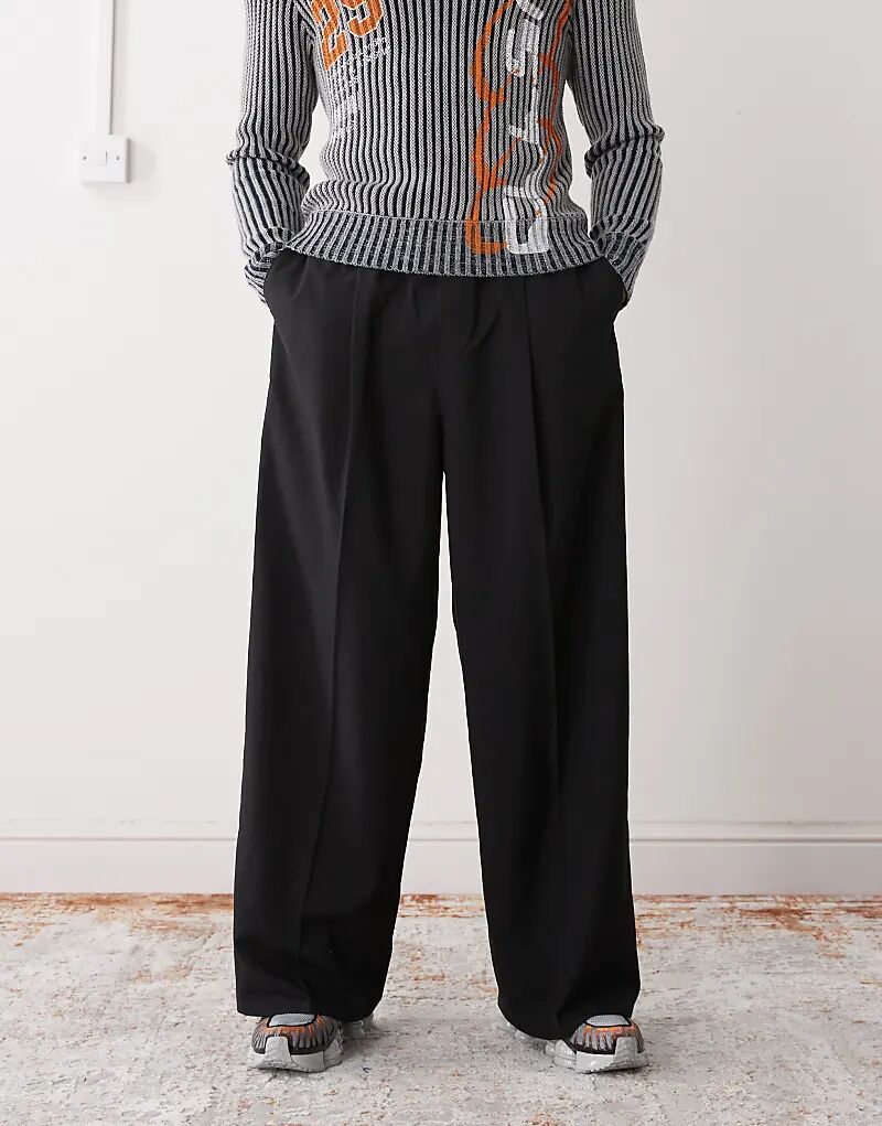 Брюки свободного кроя Weekday с эластичным поясом черного цвета
Брюки свободного кроя Weekday с эластичным поясом черного цвета