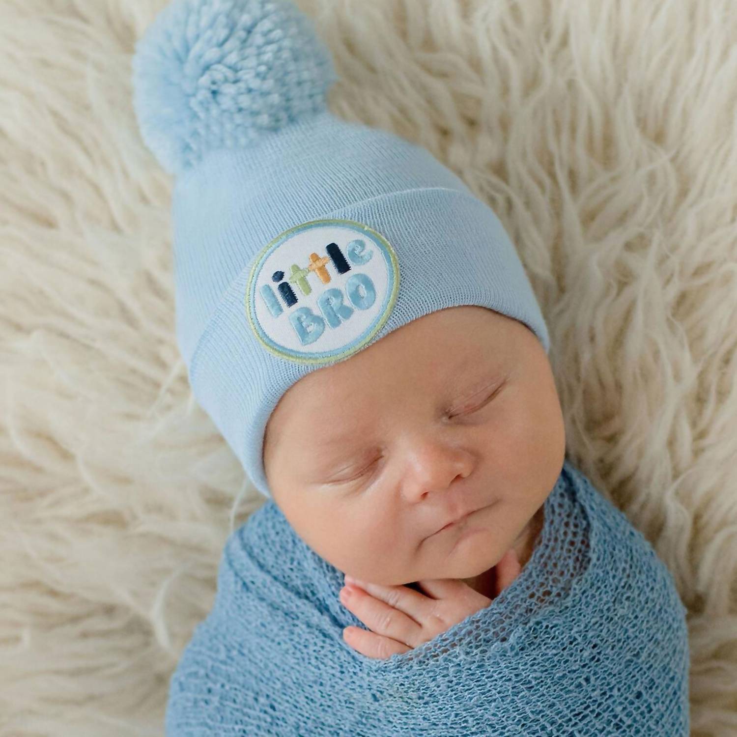 Маленькая шапочка для новорожденного с помпоном в голубом цвете Ilybean
Маленькая шапочка для новорожденного с помпоном в голубом цвете Ilybean