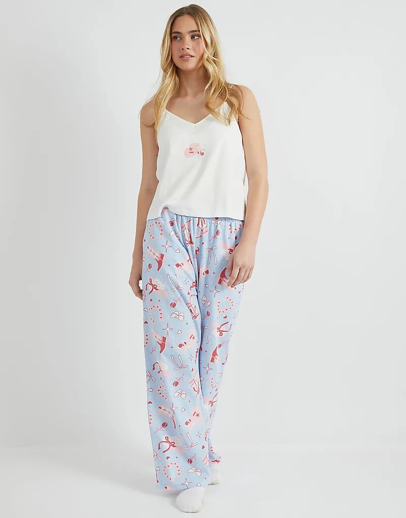 Пижамный комплект Skinnydip London cowboy coquette cami & trouser синего цвета
Пижамный комплект Skinnydip London cowboy coquette cami & trouser синего цвета