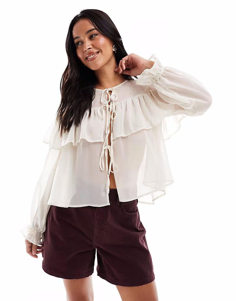 Блузка Miss Selfridge с оборками цвета экрю
Блузка Miss Selfridge с оборками цвета экрю