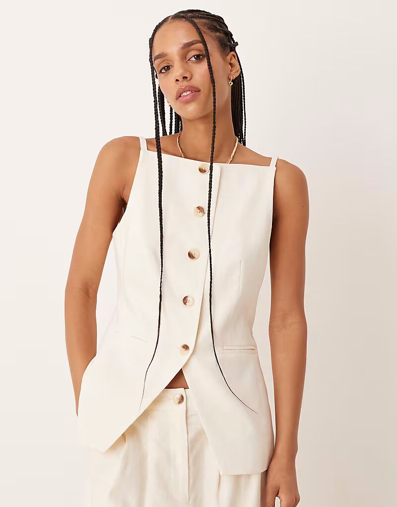 Удлиненный приталенный жилет кремового цвета Nobody'S Child
Удлиненный приталенный жилет кремового цвета Nobody'S Child