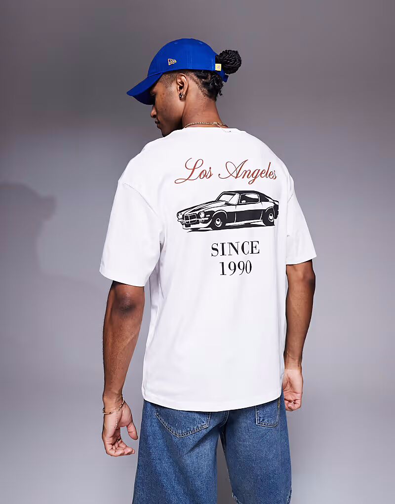 Футболка ADPT oversize кремового цвета с принтом автомобиля на спине
Футболка ADPT oversize кремового цвета с принтом автомобиля на спине