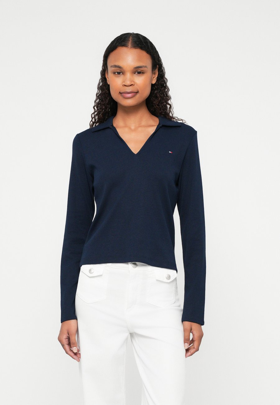 Топ Tommy Hilfiger MODERN CODY OPEN, Dark Night Navy/Dark Blue
Топ Tommy Hilfiger MODERN CODY OPEN, Dark Night Navy/Dark Blue