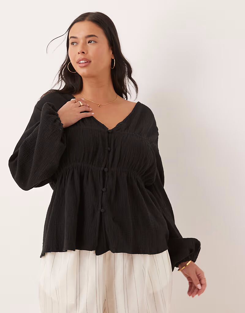 Топ ASOS DESIGN Curve с длинными рукавами и пуговицами спереди черного цвета ASOS Curve
Топ ASOS DESIGN Curve с длинными рукавами и пуговицами спереди черного цвета ASOS Curve