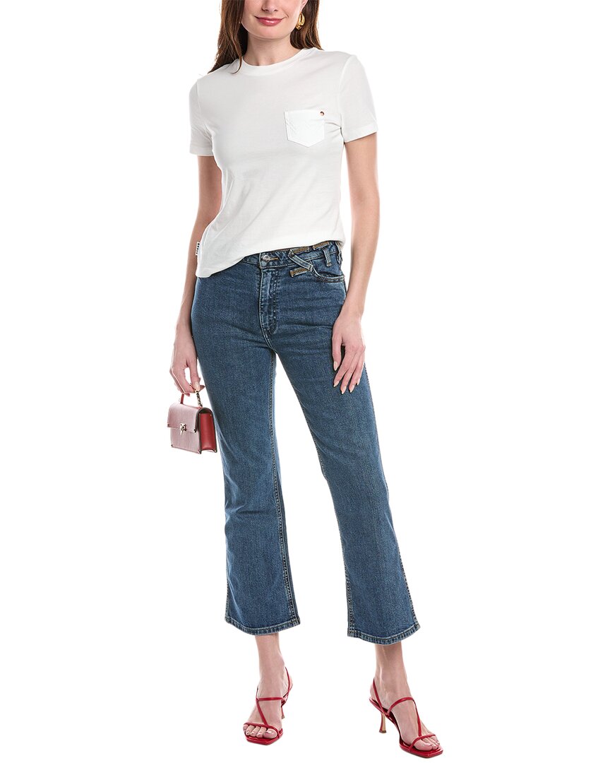 STAUD x Wrangler Укороченные джинсы-клеш с индиго-промывкой
STAUD x Wrangler Укороченные джинсы-клеш с индиго-промывкой