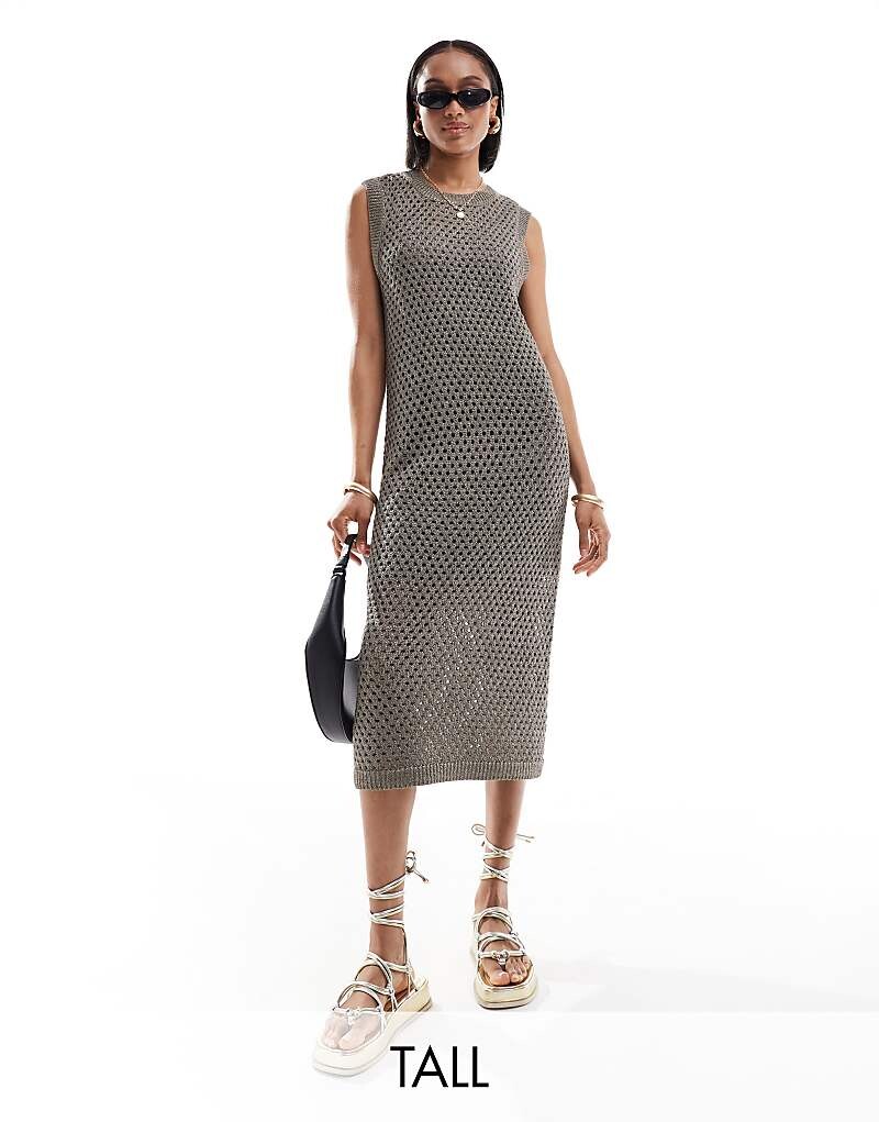 Vero Moda 2013 Коричневое полупрозрачное трикотажное платье миди с металлизированной отделкой
Vero Moda 2013 Коричневое полупрозрачное трикотажное платье миди с металлизированной отделкой