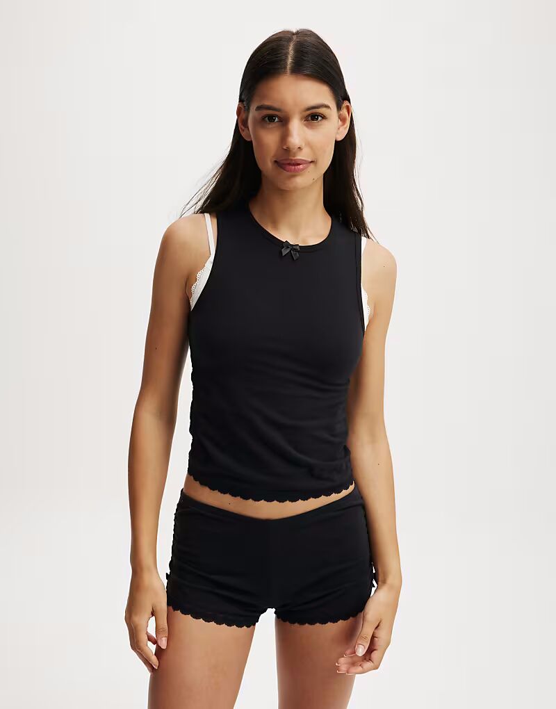 Cotton:On Черная майка из персикового джерси со сборками
Cotton:On Черная майка из персикового джерси со сборками