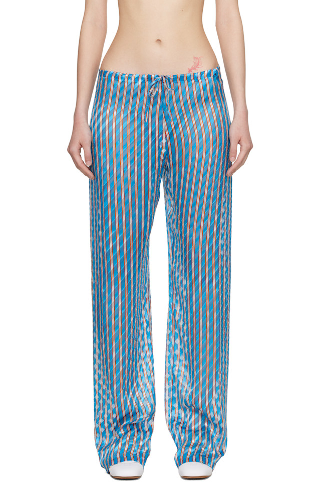 Dries Van Noten Синие брюки с резинкой, выполненные в технике деворе
Dries Van Noten Синие брюки с резинкой, выполненные в технике деворе