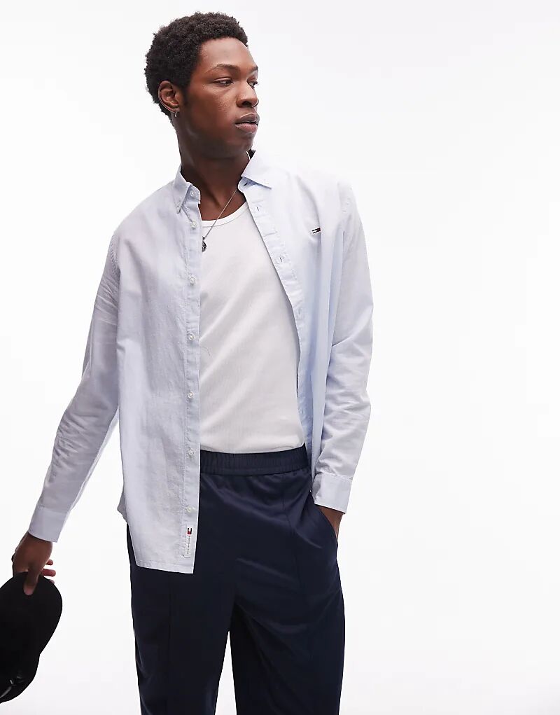 Обычная льняная рубашка Tommy Jeans синего цвета
Обычная льняная рубашка Tommy Jeans синего цвета