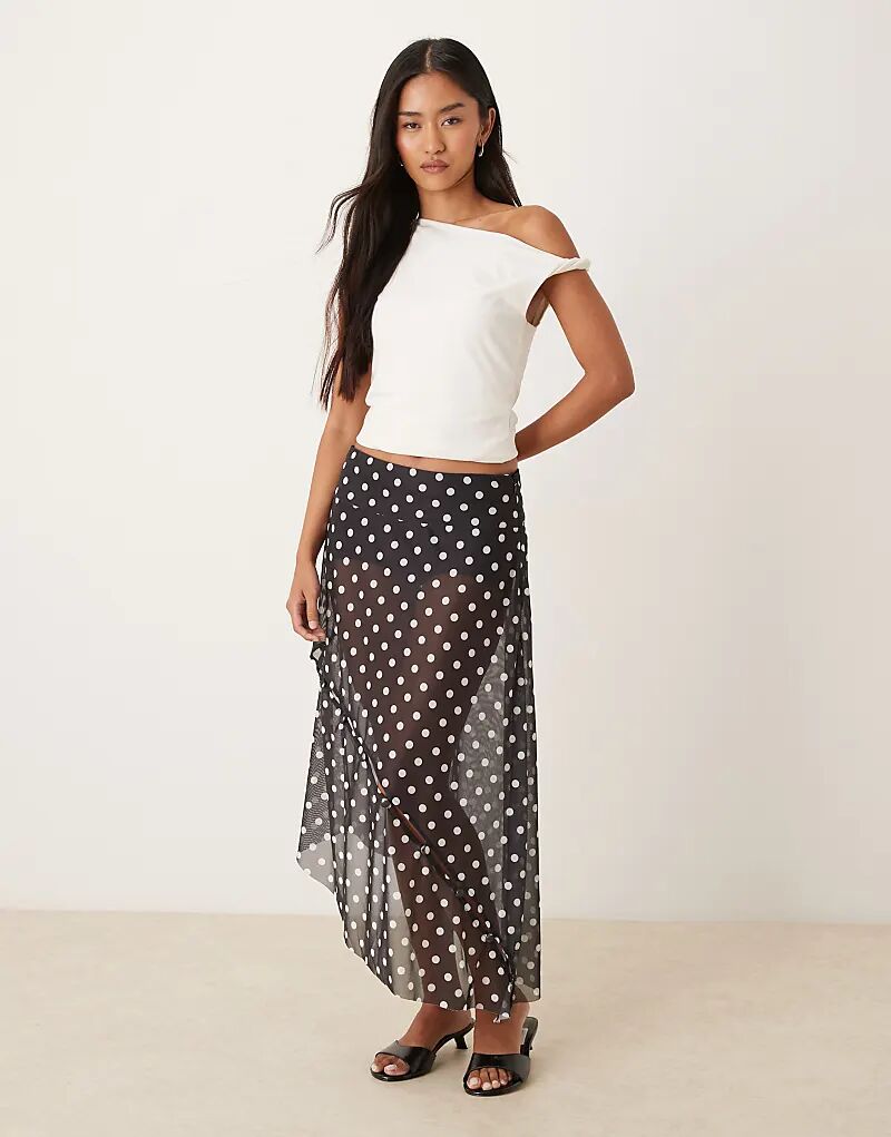 Юбка миди в горошек от House of Sunny с сетчатыми пуговицами, черного цвета
Юбка миди в горошек от House of Sunny с сетчатыми пуговицами, черного цвета