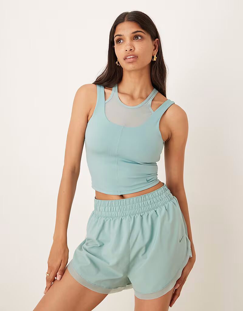 Топ One Training Dri-FIT светло-голубого цвета Nike Training
Топ One Training Dri-FIT светло-голубого цвета Nike Training