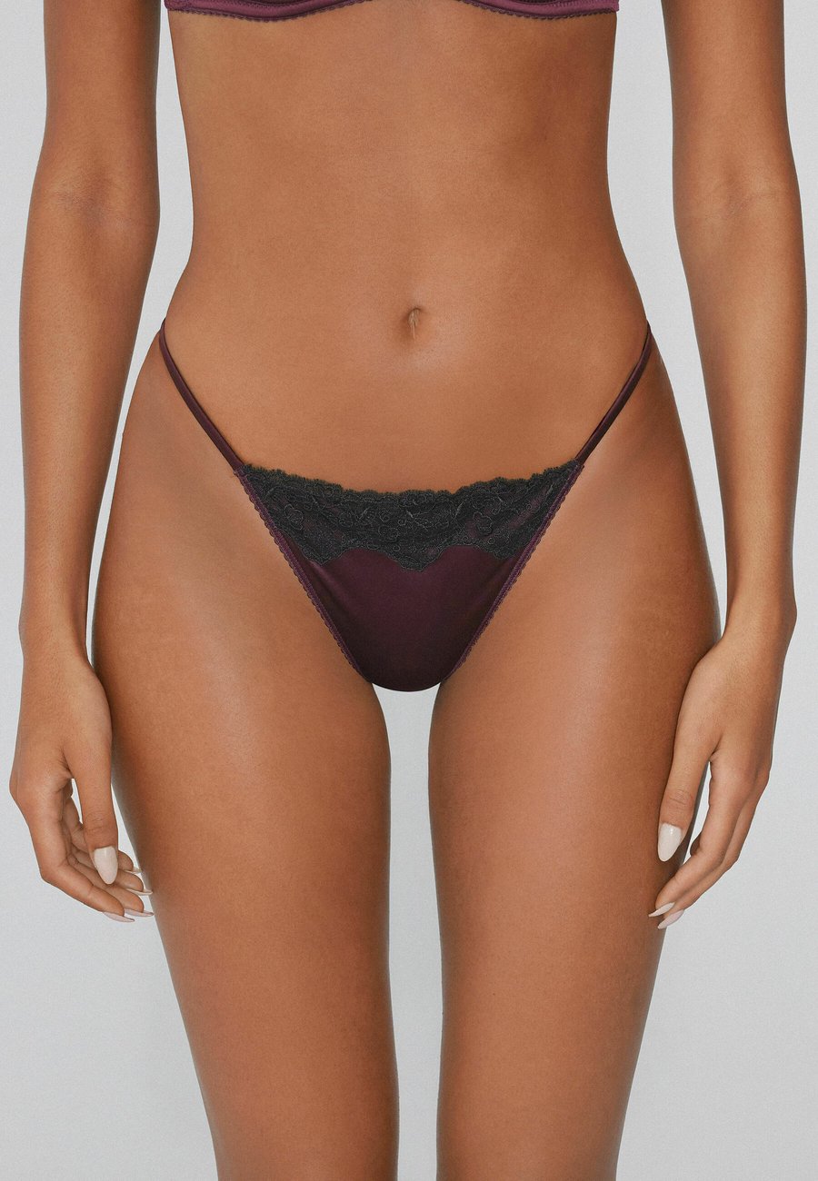 Трусы Tezenis Thong, Black/Mottled Dark Purple
Трусы Tezenis Thong, Black/Mottled Dark Purple
