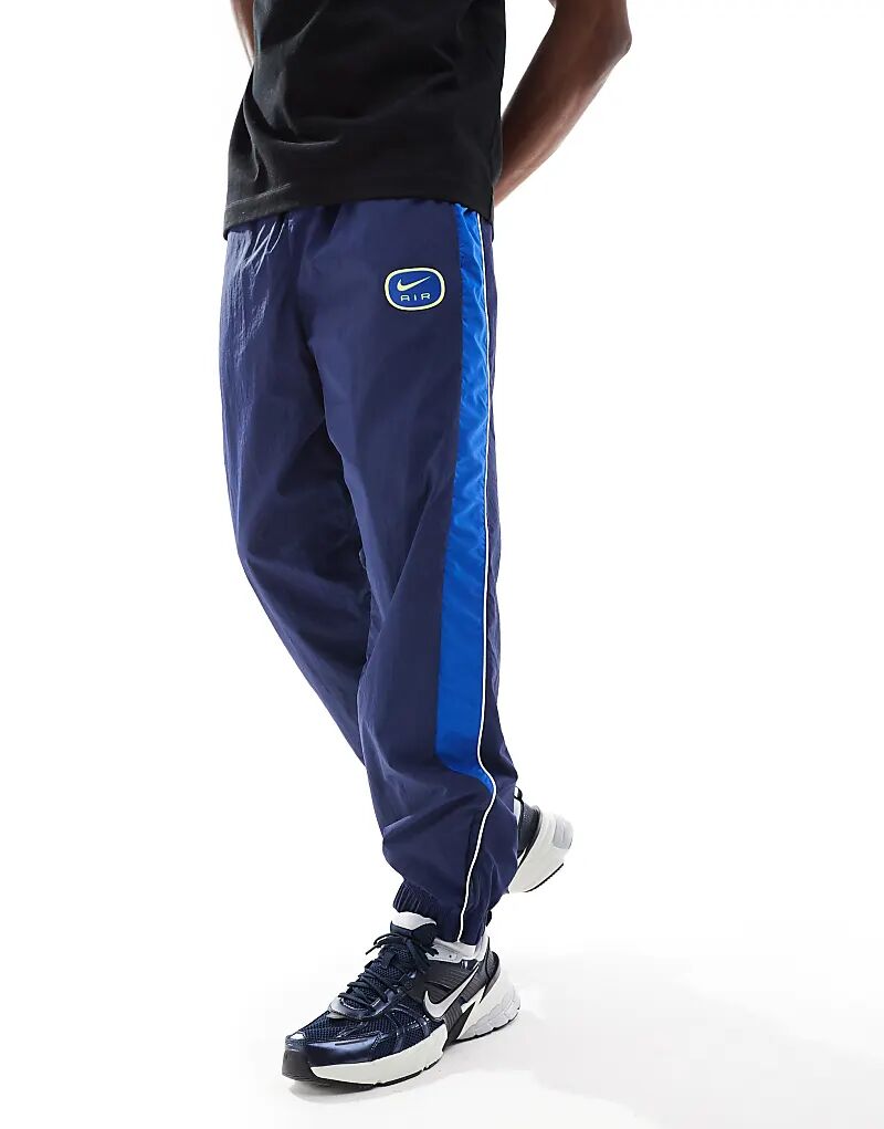 Тканые джоггеры Swoosh Air темно-синего и синего цветов Nike
Тканые джоггеры Swoosh Air темно-синего и синего цветов Nike