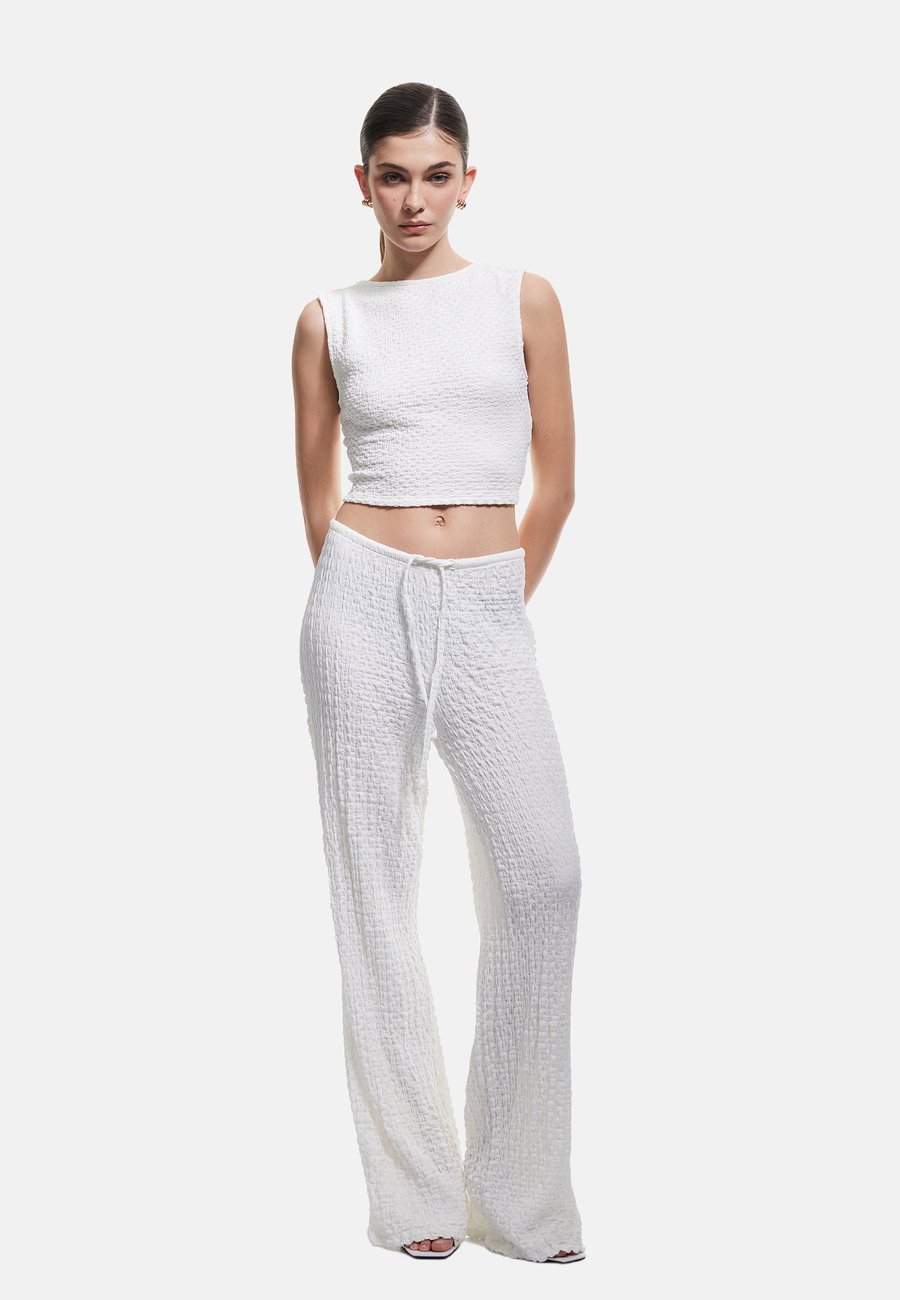 Топ Koton SLIM-FIT TEXTURED TANK , Beige
Топ Koton SLIM-FIT TEXTURED TANK , Beige