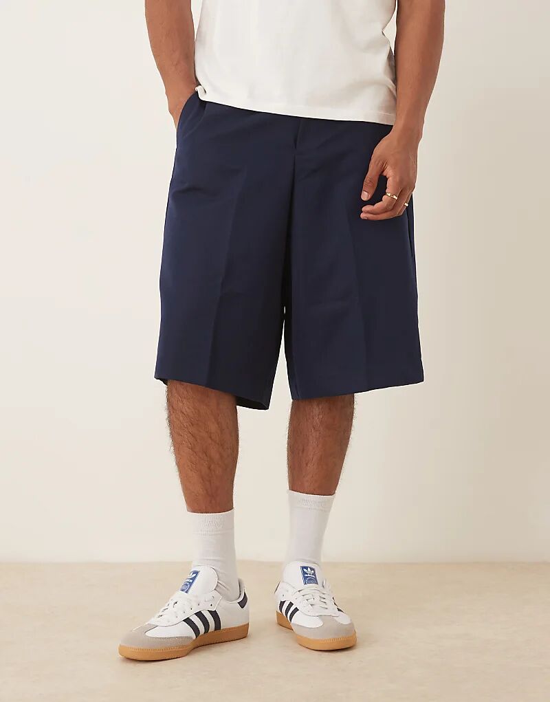 Элегантные шорты-бермуды свободного кроя ASOS DESIGN темно-синего цвета 
Элегантные шорты-бермуды свободного кроя ASOS DESIGN темно-синего цвета