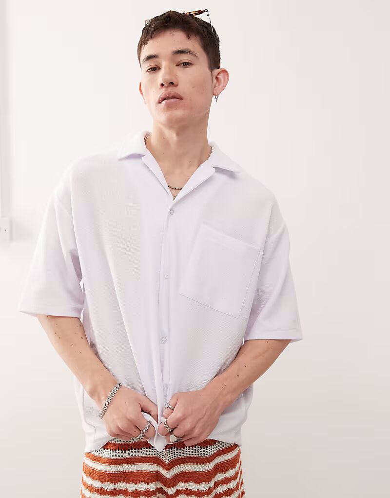 Рубашка свободного кроя из фактурного трикотажа Reclaimed Vintage с короткими рукавами белого цвета
Рубашка свободного кроя из фактурного трикотажа Reclaimed Vintage с короткими рукавами белого цвета