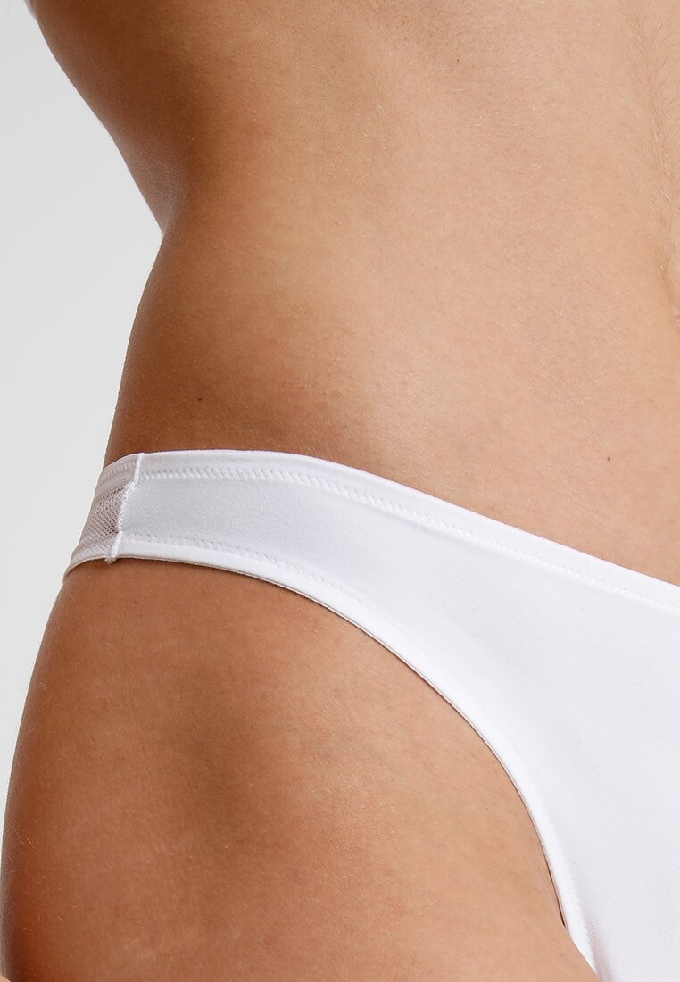 Стринги Invisible Schiesser, weiß
Стринги Invisible Schiesser, weiß