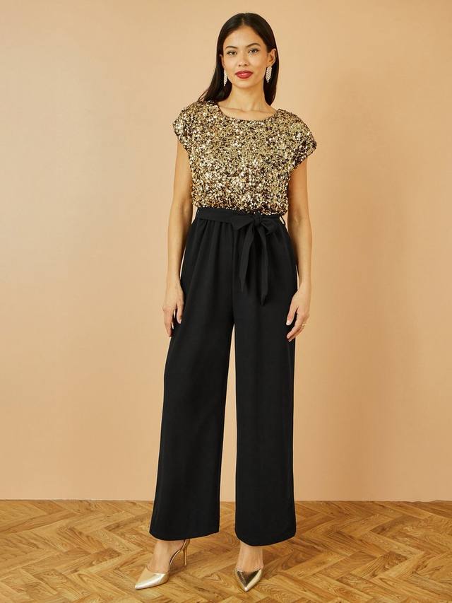 Комбинезон с круглым вырезом и короткими рукавами-крылышками из ткани с пайетками Yumi
Комбинезон с круглым вырезом и короткими рукавами-крылышками из ткани с пайетками Yumi