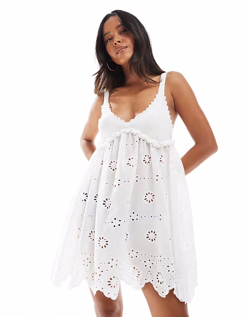 Пляжное мини-платье Miss Selfridge с контрастной вязкой и вышивкой кремового цвета
Пляжное мини-платье Miss Selfridge с контрастной вязкой и вышивкой кремового цвета