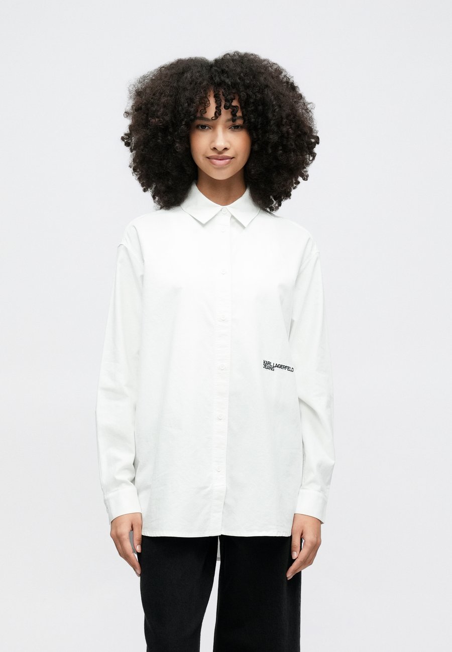 Блуза Karl Lagerfeld Jeans Button-down blouse, White
Блуза Karl Lagerfeld Jeans Button-down blouse, White